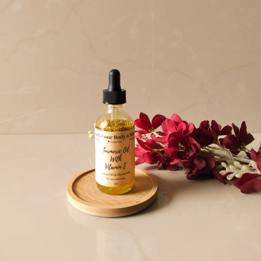 Kel's Your Body & Mine Turmeric Elixir – A nourishing, antioxidant-rich oil blend infused with turmeric, carrot, papaya, and chamomile to brighten skin, reduce dark spots, and promote a healthy, radiant glow.
